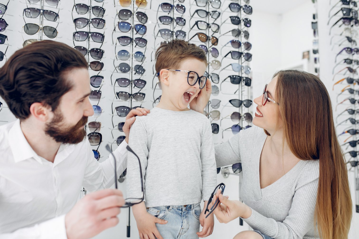 Family with Little Son in the Glasses Store