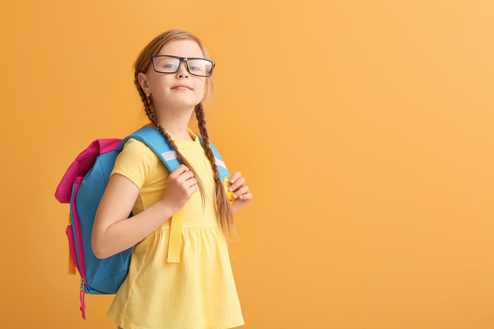 Schoolgirl with Schoolbag and Eyeglasses